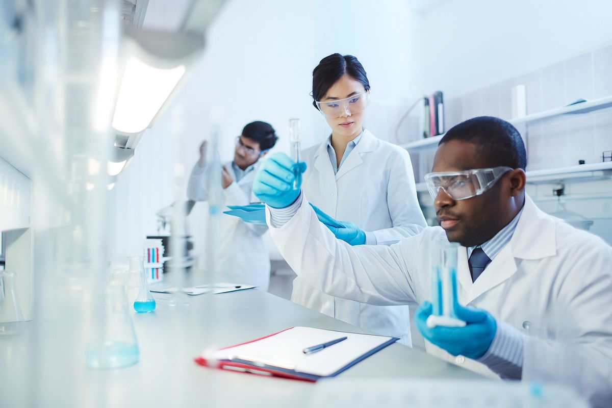 Scientists performing water quality testing in a modern laboratory